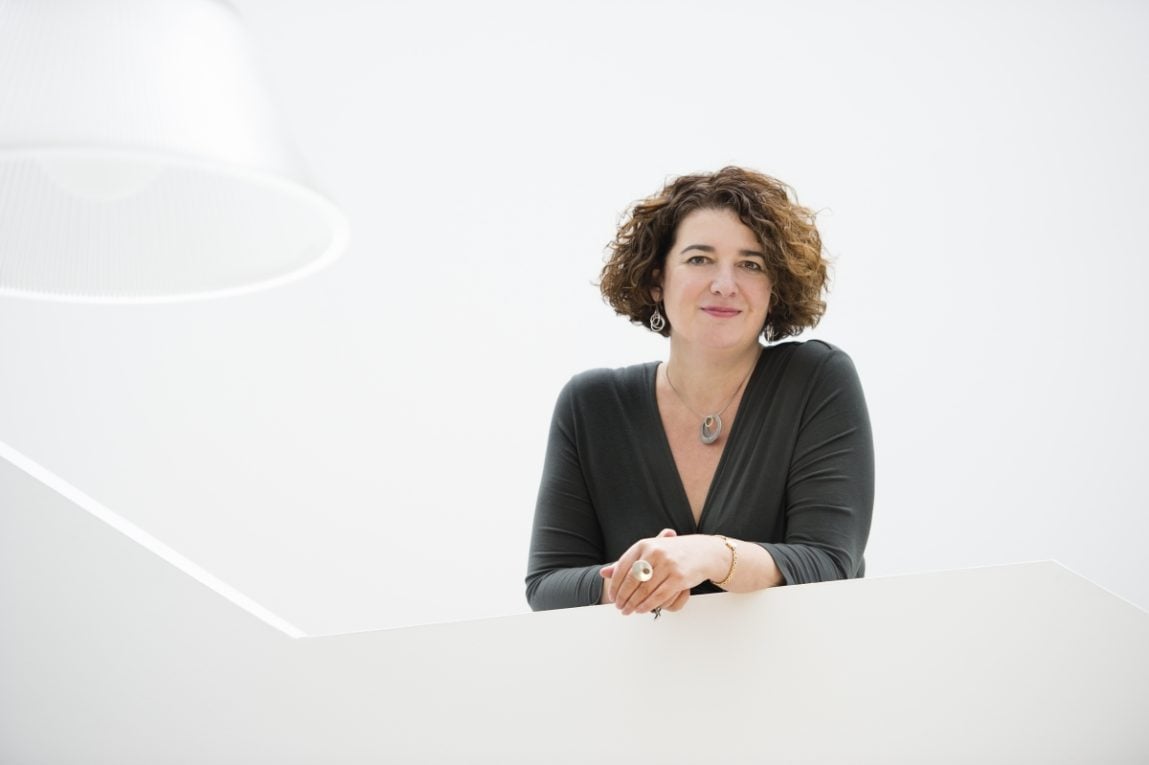 A headshot of Moira Sinclair, smiling