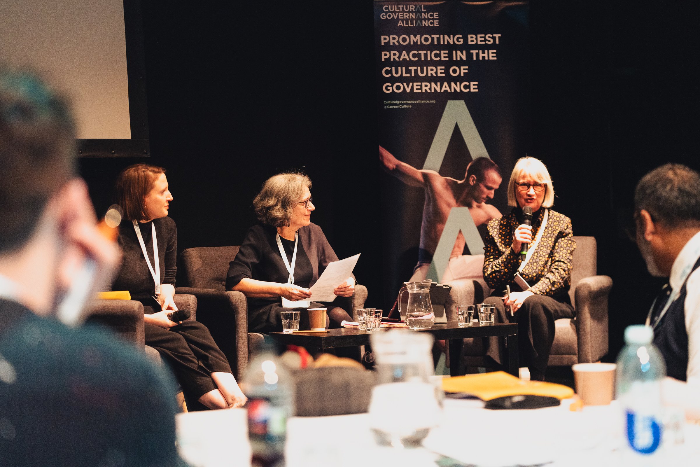 Three people speaking on a panel at the 2023 Governance Now conference