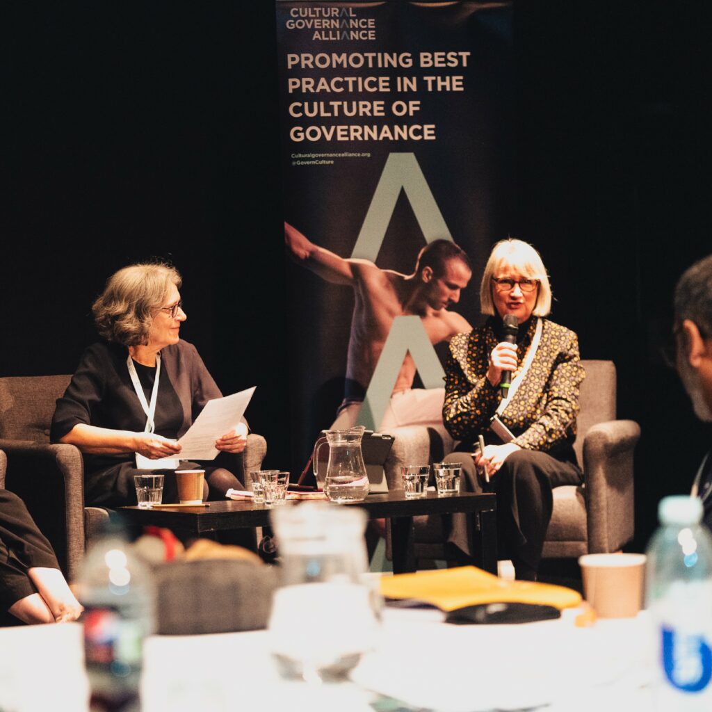 Two speakers during a panel discussion for the 2023 Governance Now conference