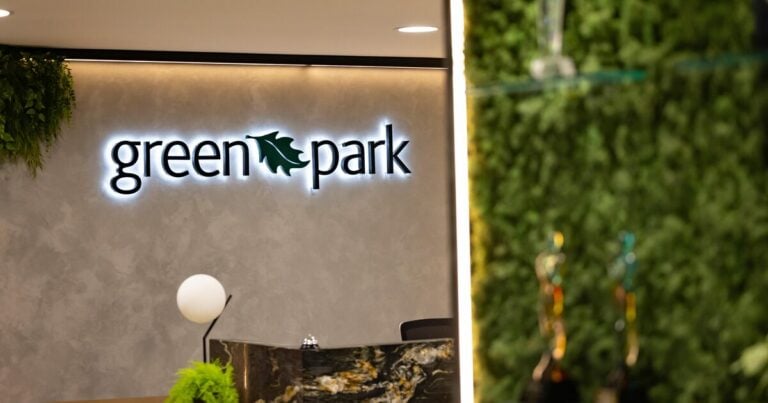 Green Park's logo on the wall of an office