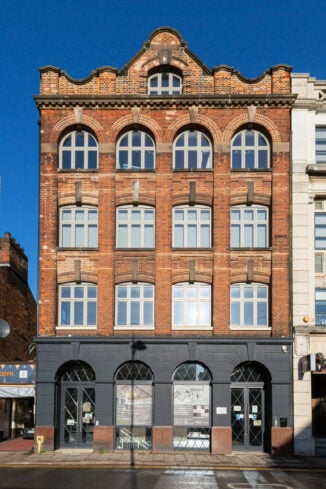 External image of Hat House with blue skies in Luton