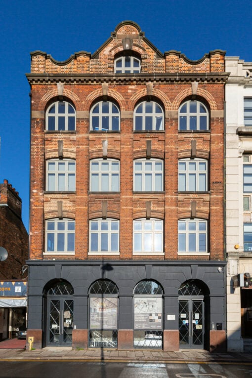 External image of Hat House with blue skies in Luton