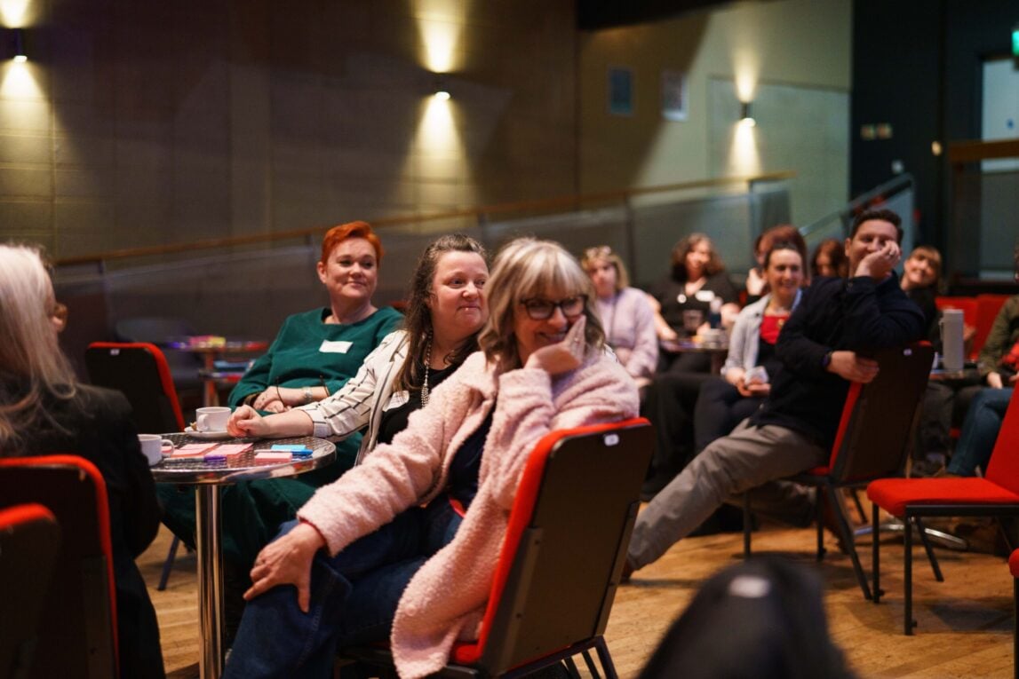 Photo of cultural leaders watching a speaker at the Tees Valley Annual gathering