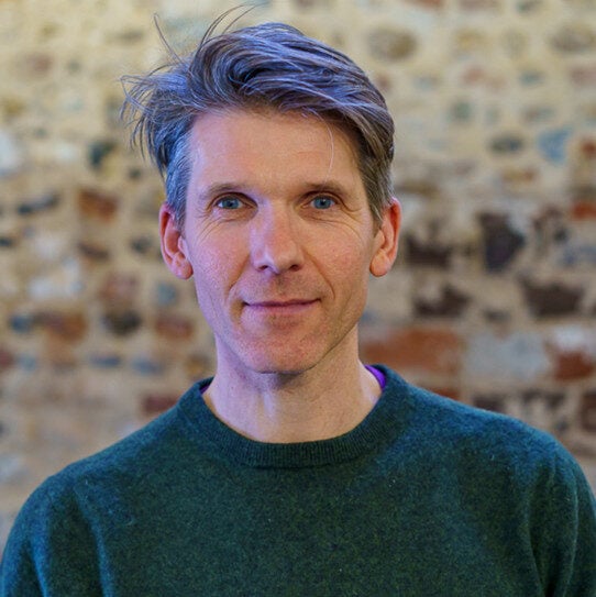 Headshot of Fearghus O Conchuir
